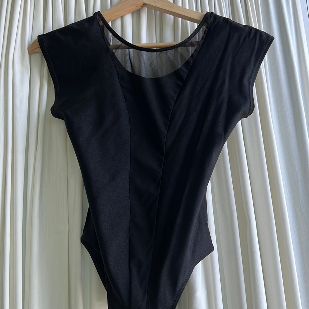 Medium - American Apparel - Black bodysuit with deep v neck mesh slit